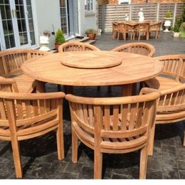 Teak garden dining table. 1.8m Titan round table with 4 bow wood style seats